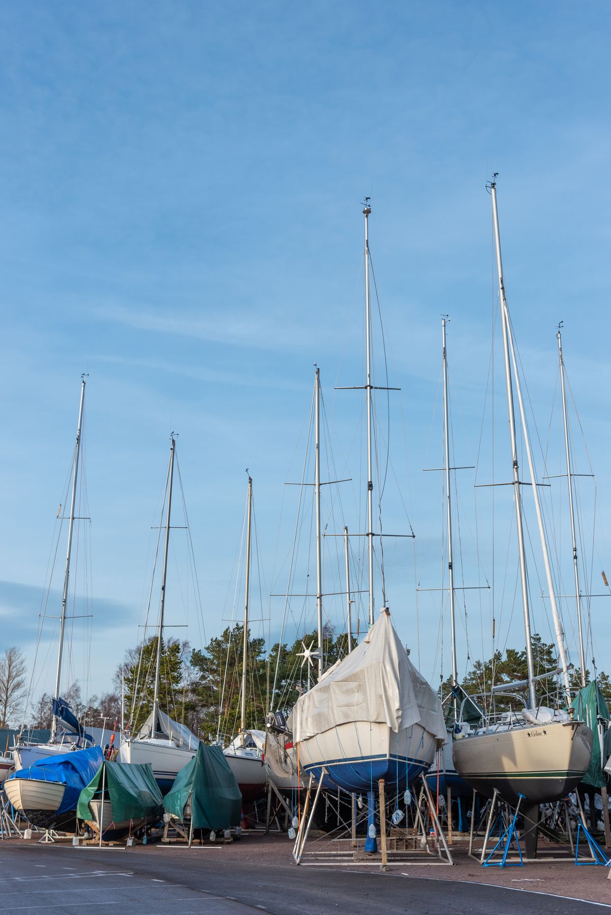 Sailboats laid up on cradles in a boatyard